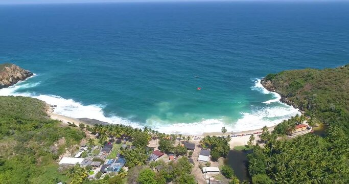 Aerial Shot pan left Beach Bay cepe - Aragua  Venezuela,.