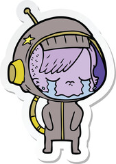 sticker of a cartoon crying astronaut girl