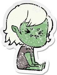 Obraz premium distressed sticker of a annoyed cartoon vampire girl