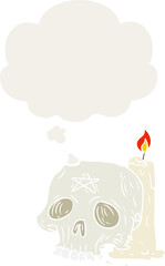 cartoon spooky skull and candle and thought bubble in retro style