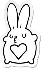 sticker of a cute cartoon rabbit with love heart