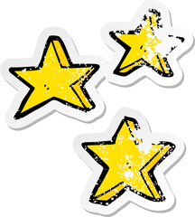 distressed sticker of a cartoon stars