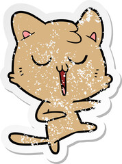distressed sticker of a cartoon cat singing