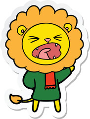 sticker of a cartoon lion in winter clothes