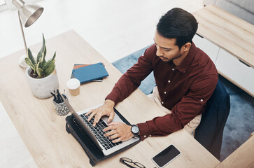 Business man typing, laptop and concentrate on work, tech support with keyboard and productivity in...
