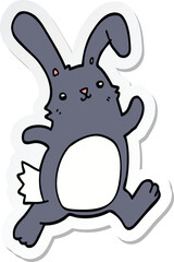 sticker of a cartoon rabbit running