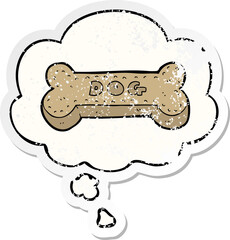 cartoon dog biscuit and thought bubble as a distressed worn sticker