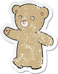 retro distressed sticker of a cartoon teddy bear