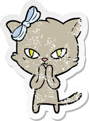 distressed sticker of a cute cartoon cat