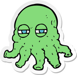 sticker of a cartoon alien face