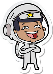 Fototapeta premium sticker of a cartoon laughing astronaut