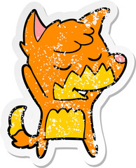 distressed sticker of a friendly cartoon fox