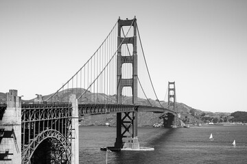 Golden Gate Bridge San Francisco with blue sky and no fog or clouds. Picture is in b/w. View from Golden Gate Viewpoint