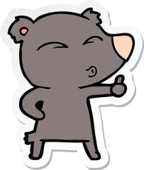 sticker of a cartoon whistling bear