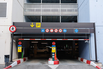 Entrance to a Covered Parking Lot Set up on Several Floors