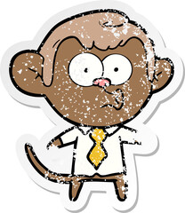 distressed sticker of a cartoon office monkey