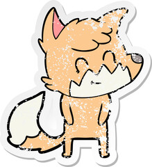 distressed sticker of a cartoon friendly fox