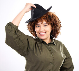 Fototapeta premium Black woman, smile and portrait with a hat in studio for fashion, style and happiness or beauty. Face, happy model or person isolated on white background with stylish accessory, kindness and respect