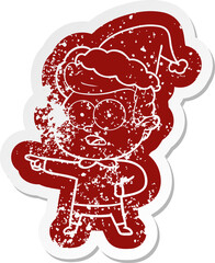 cartoon distressed sticker of a staring man wearing santa hat