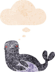 cartoon seal and thought bubble in retro textured style