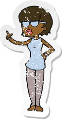 retro distressed sticker of a cartoon woman wearing spectacles