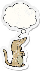 cartoon dog and thought bubble as a distressed worn sticker