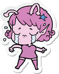 Obraz premium sticker of a cartoon crying alien girl