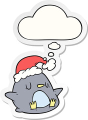 cute cartoon penguin and thought bubble as a printed sticker