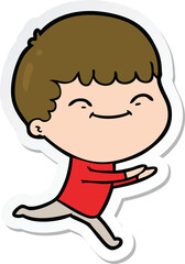 sticker of a cartoon happy boy