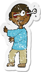 retro distressed sticker of a cartoon boy with popping out eyes