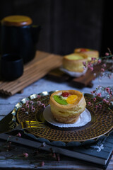 choux cream fruit, kue soes in dark background