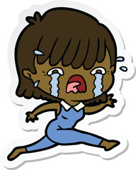 sticker of a cartoon girl crying