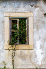 Fototapeta na wymiar abandoned building exterior wall and window