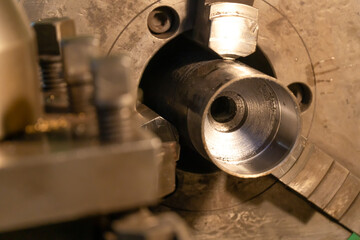 Industry milling mechanical turning metalworking metalworking of metal parts, production of industrial Lathes for cutting metal parts shafts with lathe tools. Metalworking process with lathe.