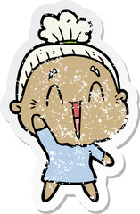distressed sticker of a cartoon happy old lady