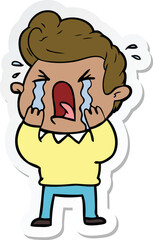 sticker of a cartoon crying man