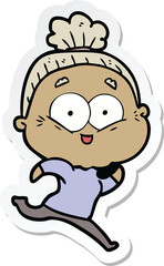 sticker of a cartoon happy old woman