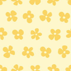 Seamless pattern of stylized flowers. Hand drawn small yellow flowers. Seamless floral background in yellow colors.