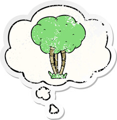 cartoon tree and thought bubble as a distressed worn sticker