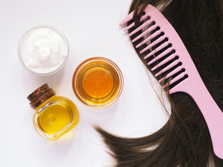Natural ingredients for homemade hair mask: olive oil, yogurt, honey