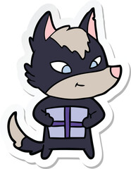 sticker of a friendly cartoon wolf with gift