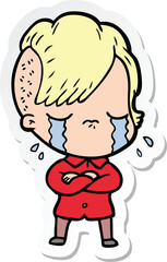 sticker of a cartoon crying girl with crossed arms