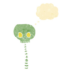 cartoon spooky skull and spine with thought bubble