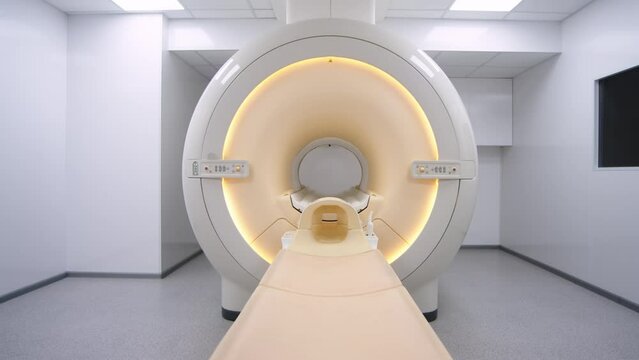 MRI scanner room. Magnetic Resonance Imaging machine. Hospital room with tomograph. The light turning on in medical ward