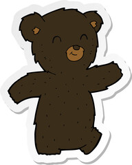 sticker of a cute cartoon black bear