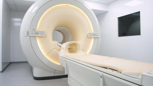 MRI scanner room. Magnetic Resonance Imaging machine. Hospital room with tomograph