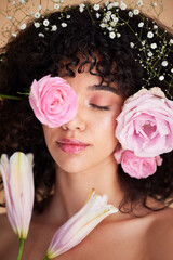 Beauty, flowers and face of woman relax with makeup, cosmetics and hair care for wellness, glamour and glow. Spring aesthetic, spa and girl model for natural, skincare and facial treatment in studio