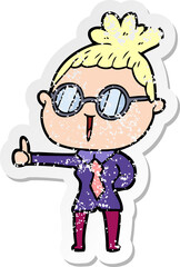 distressed sticker of a cartoon woman wearing spectacles