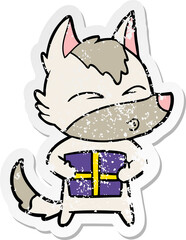 distressed sticker of a cartoon christmas wolf whistling