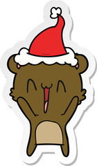 happy bear sticker cartoon of a wearing santa hat